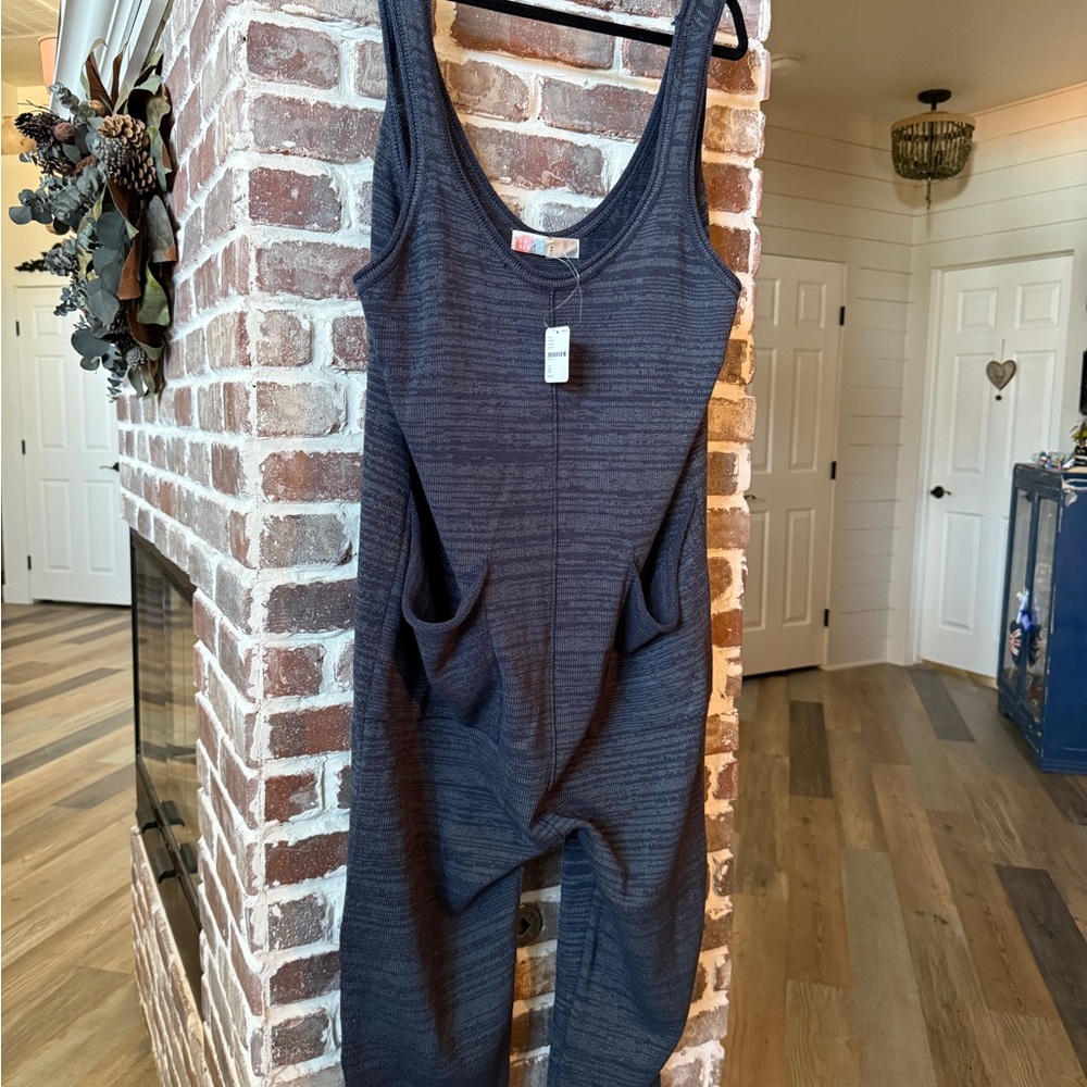 Free People Black Sleeveless Jumpsuit with Wide Legs and V-Neckline